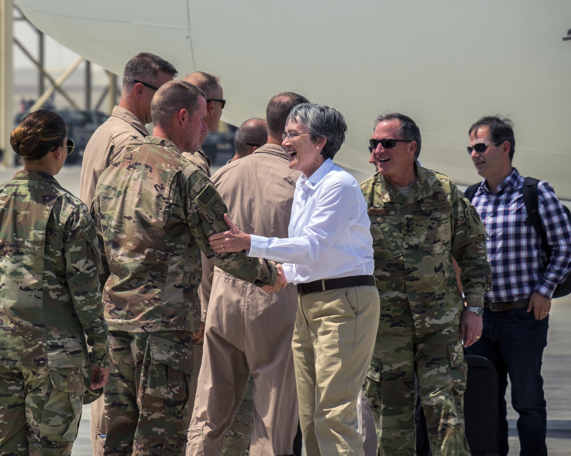 Secretary of the Air Force Heather Wilson, center, and Air Force Chief of Staff Gen. David L. Goldfein are greeted by 380th Air Expeditionary Wing leadership Aug. 18, 2017, Al Dhafra Air Base, United Arab Emirates.