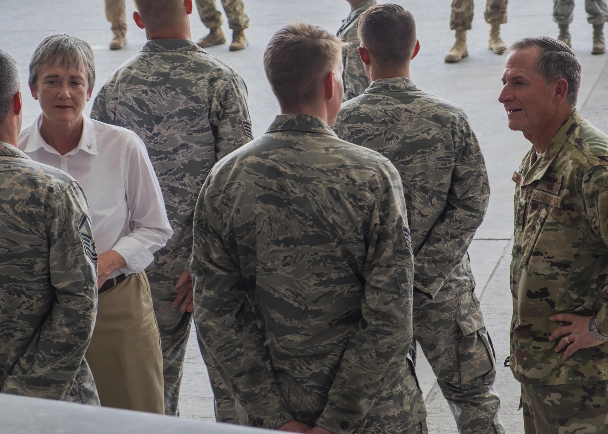 Secretary of the Air Force Heather Wilson, left, and Air Force Chief of Staff Gen. David L. Goldfein speak with Airmen from the 380th Air Expeditionary Wing Aug. 18, 2017, Al Dhafra Air Base, United Arab Emirates.