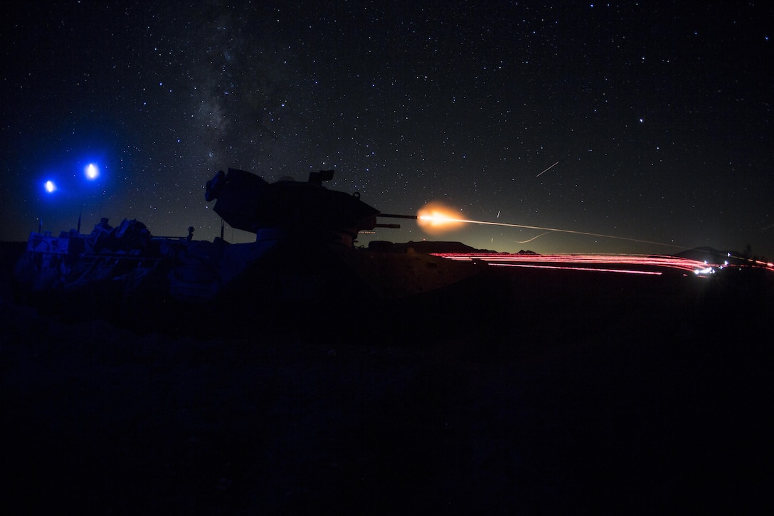 Marines fire an M2 .50 caliber machine gun, mounted to an amphibious assault vehicle, at simulated enemy targets during Large scale Exercise-17 at Twentynine Palms, Calif., Aug. 15-18, 2017. LSE-17 is a multinational exercise, led by 2nd Marine Division, with elements from the United Kingdom, France, Canada and II Marine Expeditionary Force, focused on integrating all capabilities of the Marine Air-Ground Task Force and coalition forces.