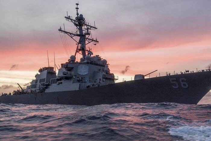 The guided-missile destroyer USS John S. McCain on the ocean.