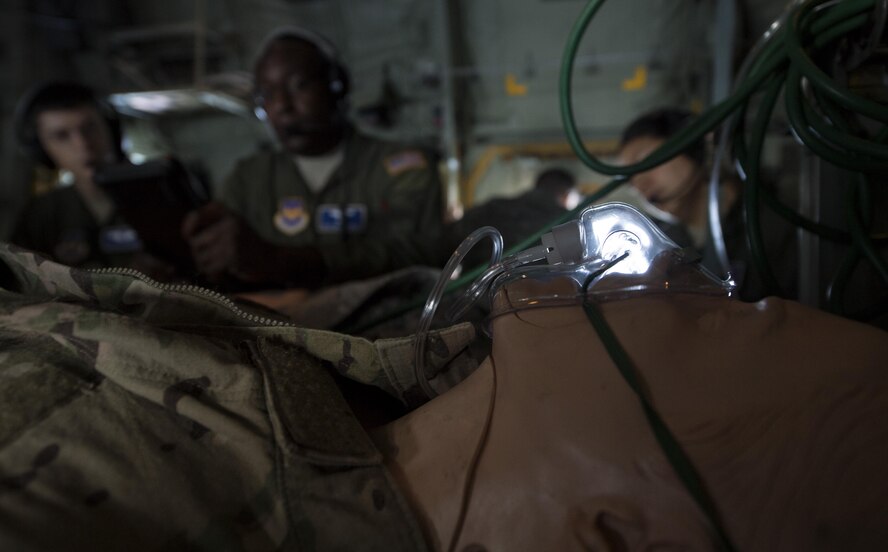 A U.S. Air Force medical mannequin lies on a stretcher during the 86th Aeromedical Evacuation Squadron’s aeromedical training mission while flying to Lajes Field, Portugal, Aug. 15, 2017. The Airmen were aboard a C-130J Super Hercules to conduct their training. (U.S. Air Force photo by Senior Airman Tryphena Mayhugh)