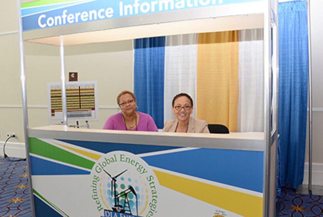 DLA Energy employees work conference information booth