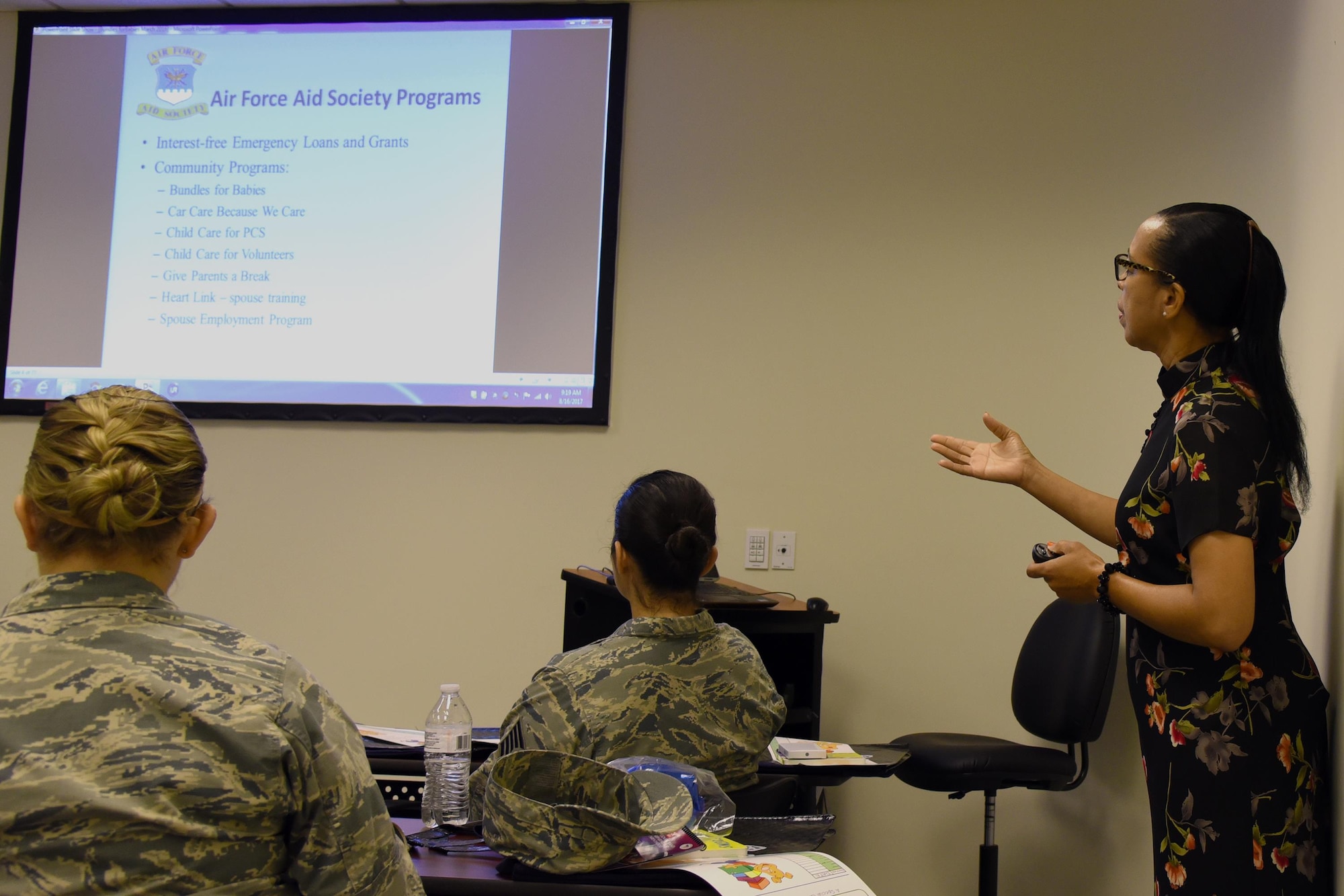 Camelia Jefferson, 23d Force Support Squadron Airman and Family Readiness Center community readiness specialist, explains a presentation at the Bundles for Babies event, Aug. 16, 2017, at Moody Air Force Base, Ga. Bundles for Babies helps expectant families prepare for the challenges that will arise once their child is born. (U.S. Air Force photo by Airman Eugene Oliver)