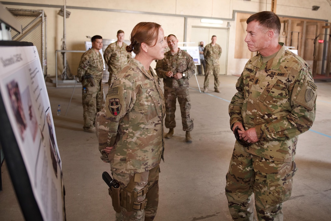 A soldier talking to an airman in Kabul.