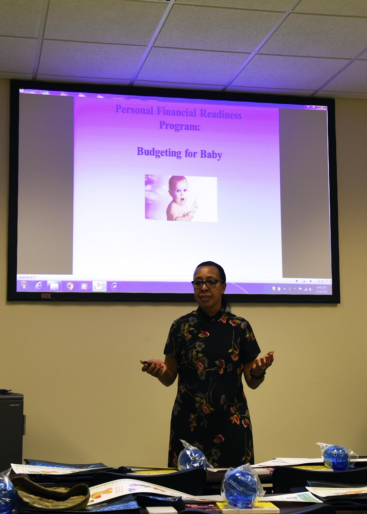 Camelia Jefferson, 23d Force Support Squadron Airman and Family Readiness Center community readiness specialist, teaches expectant mothers how to financially plan for their unborn baby at the Bundles for Babies event, Aug. 16, 2017, at Moody Air Force Base, Ga.  Bundles for Babies helps expectant families prepare for the challenges that may arise once their child is born. (U.S. Air Force photo by Airman Eugene Oliver)