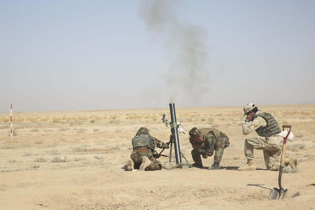 Afghan National Army soldiers with the Helmand Regional Military Training Center fire an 82mm mortar during a training range at Camp Shorabak, Afghanistan, Aug. 17, 2017. More than 60 instructors at the RMTC are undergoing a four-week train-the-trainer course in preparation for an upcoming operational readiness cycle. U.S. Marine advisors with Task Force Southwest are enhancing the infantry knowledge and skills of the instructors to more effectively teach and train soldiers throughout the eight-week ORC. (U.S. Marine Corps photo by Sgt. Lucas Hopkins)