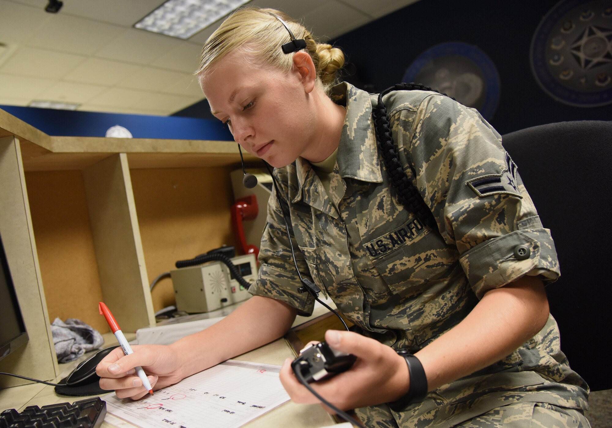 Airman 1st Class Brooke Dobbins, 334th Training Squadron student, reviews study material at Cody Hall Aug. 17, 2017, on Keesler Air Force Base, Miss. Dobbins will graduate with perfect scores throughout the aviation resource management apprentice course Aug. 18. After graduation she will return to the 465th Air Refueling Squadron, Tinker Air Force Base, Okla. (U.S. Air Force photo by Kemberly Groue)