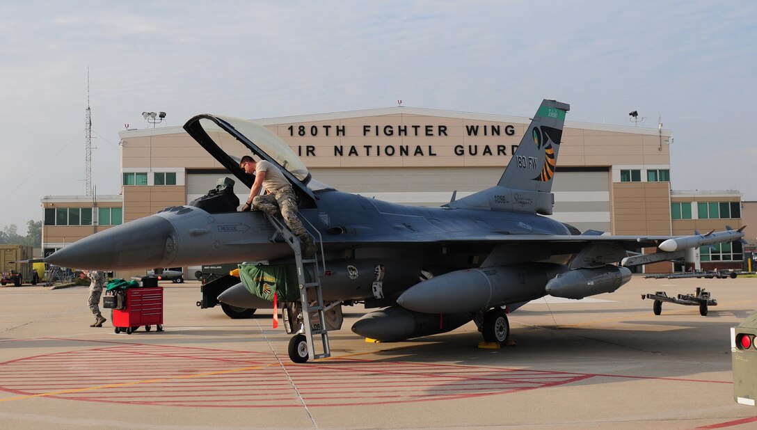 U.S. Air Force Airman 1st Class Norville Maston, a crew chief assigned to the 180th Fighter Wing, checks the cockpit of an F-16 Fighting Falcon on the flightline June 14, 2017 at the Ohio Air National Guard’s 180FW in Swanton, Ohio. Routine maintenance ensures aircraft are combat ready for any situation. (U.S. Air National Guard photo by Airman Hope Geiger)