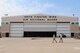 Airmen walk in front of the hangar on the flightline June 14, 2017 at the Ohio Air National Guard’s 180th Fighter Wing in Swanton, Ohio. The 180FW provides protection of the homeland, effective combat power and defense support to civil authorities, while developing Airmen, supporting their families and serving in our community. (U.S. Air National Guard photo by Airman Hope Geiger)