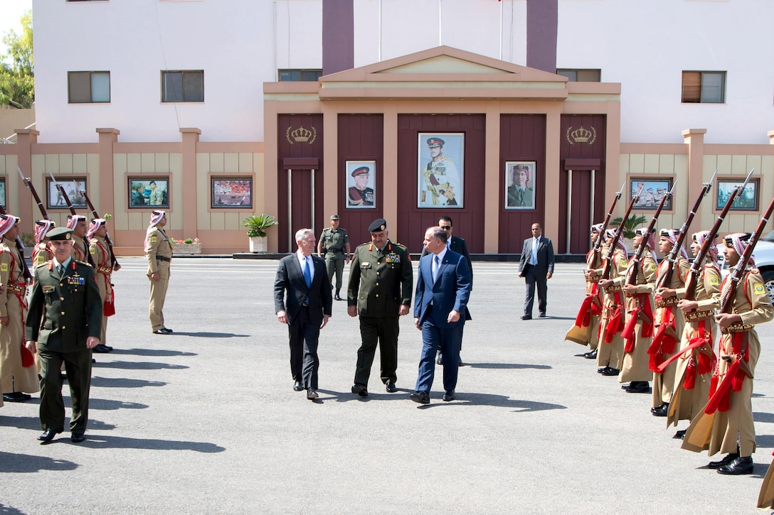 Defense Secretary Jim Mattis walks with a prince of Jordan.