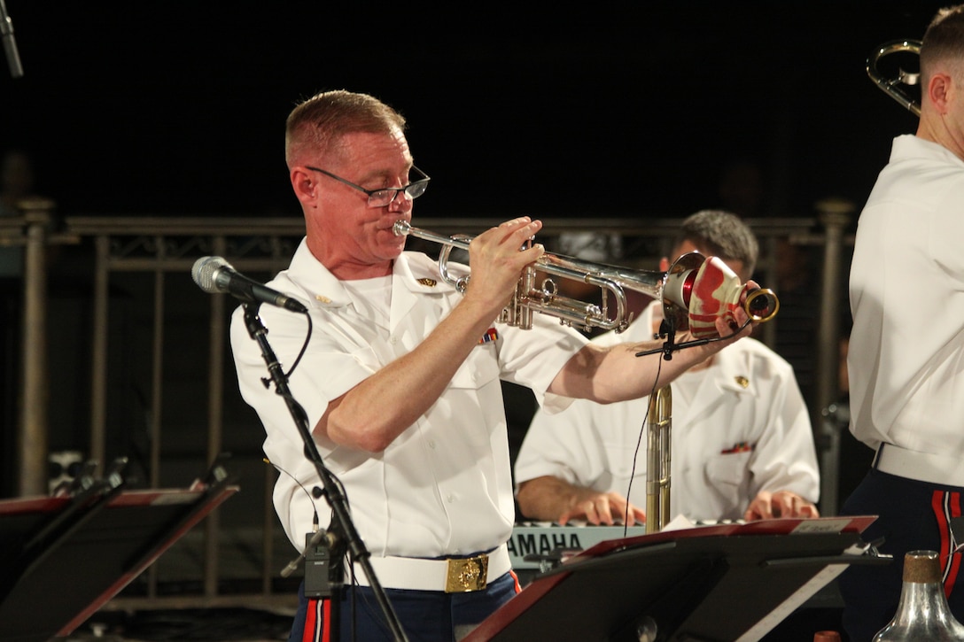 On Aug. 27, 2014, the Marine Dixieland Band performed at the West Terrace of the U.S. Capitol in Washington, D.C. The group is comprised of trumpet player Gunnery Sgt. Daniel Orban, clarinet player Gunnery Sgt. Gregory Ridlington, trombone player Staff Sgt. Ryan McGeorge, pianist Gunnery Sgt. Russell Wilson, guitar player Gunnery Sgt. Alan Prather, drummer Master Sgt. David Murray, sousaphone player Gunnery Sgt. Mark Thiele, and guest clarinetist Master Sgt. Jihoon Chang. (U.S. Marine Corps photo by Master Sgt. Kristin duBois/released)