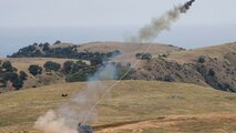 U.S. Marines with 3rd Assault Amphibian Battalion, 1st Marine Division, fire a MK-154 Launcher Mine Clearance on Camp Pendleton, Calif., June 23, 2017. Marine Corps Systems Command has reengineered the MK-154 with a new hydraulic and electrical system that makes the capability safer, more reliable and cheaper to maintain. (U. S. Marine Corps photo by Lance Cpl. Maritza Vela)