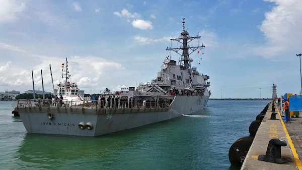 The destroyer USS John S. McCain arrives at Changi Naval Base, Singapore.