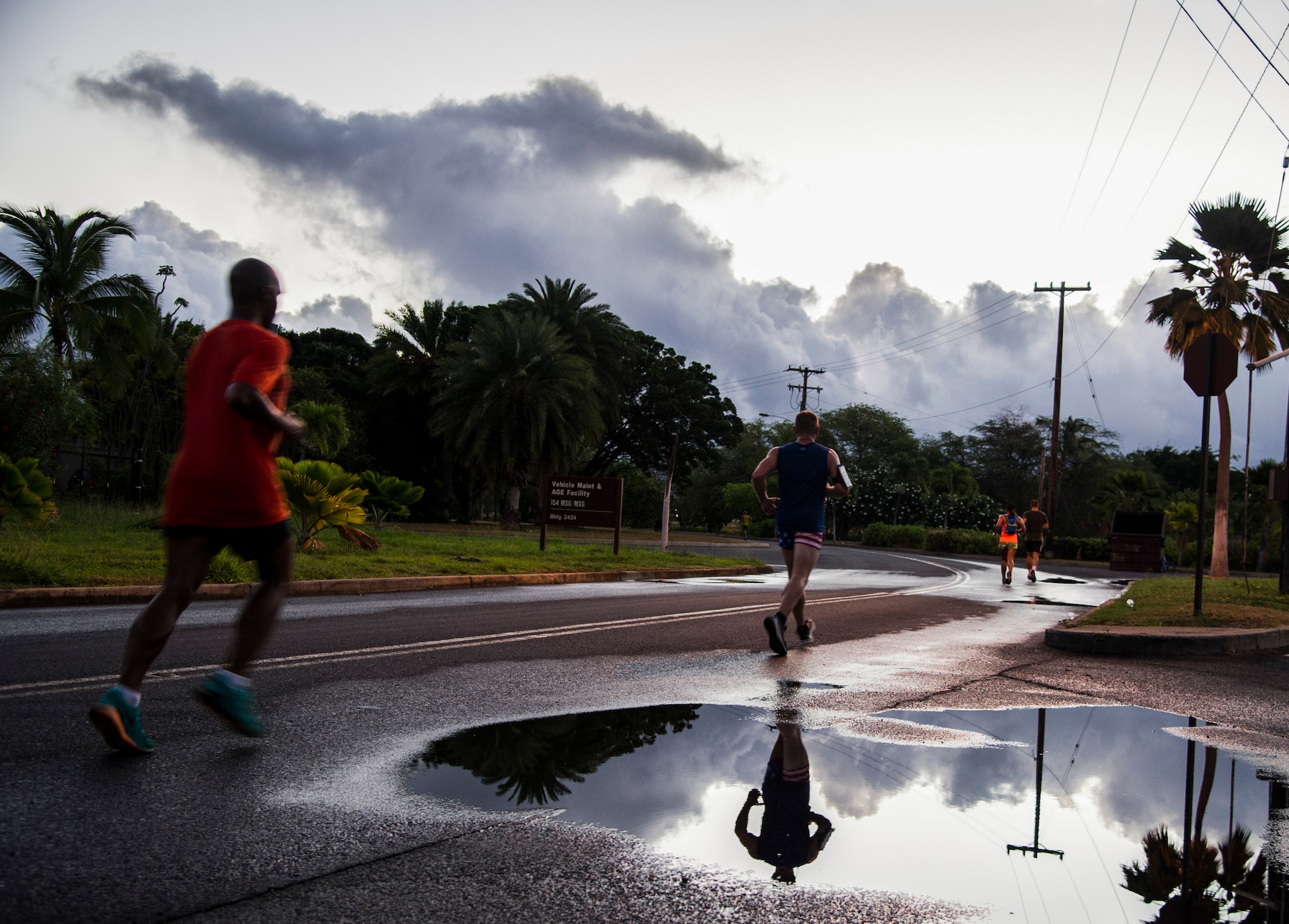 Participants run past the Hickam Beach during the 11th Annual Hickam Half Marathon, Joint Base Pearl Harbor-Hickam, Hawaii, Aug. 19, 2017.