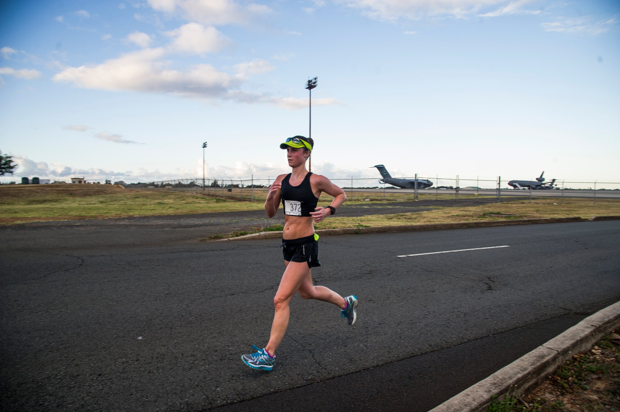 Cora Freeman sprints to the finish line during the 11th Annual Hickam Half Marathon, Joint Base Pearl Harbor-Hickam, Hawaii, Aug. 19, 2017.