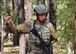 Tech. Sgt. Jeremy Sutton, 944th Security Forces Squadron fire team member, directs fire team movements Sept. 9 during combat training at Camp Navajo, Arizona Army National Guard facility in Bellemont Arizona. (U.S. Air Force photo by Tech. Sgt. Barbara Plante)