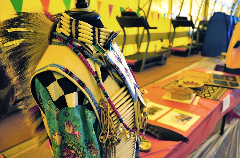 Staff Sgt. Antonia Thomas, 310th Operations Support Squadron, displays traditional Navajo dress on manequins at her booth during Schriever's Diversity Day