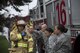 Staff Sgt. Rico Blas Castro, 374th Civil Engineer Squadron firefighter, secures simulated injured patients during an active shooter exercise, Aug. 16, 2017, at Yokota Air Base, Japan. The exercise consisted of a simulated active shooter with multiple personnel who were simulated being injured or dead. (U.S. Air Force photo by Airman 1st Class Donald Hudson)