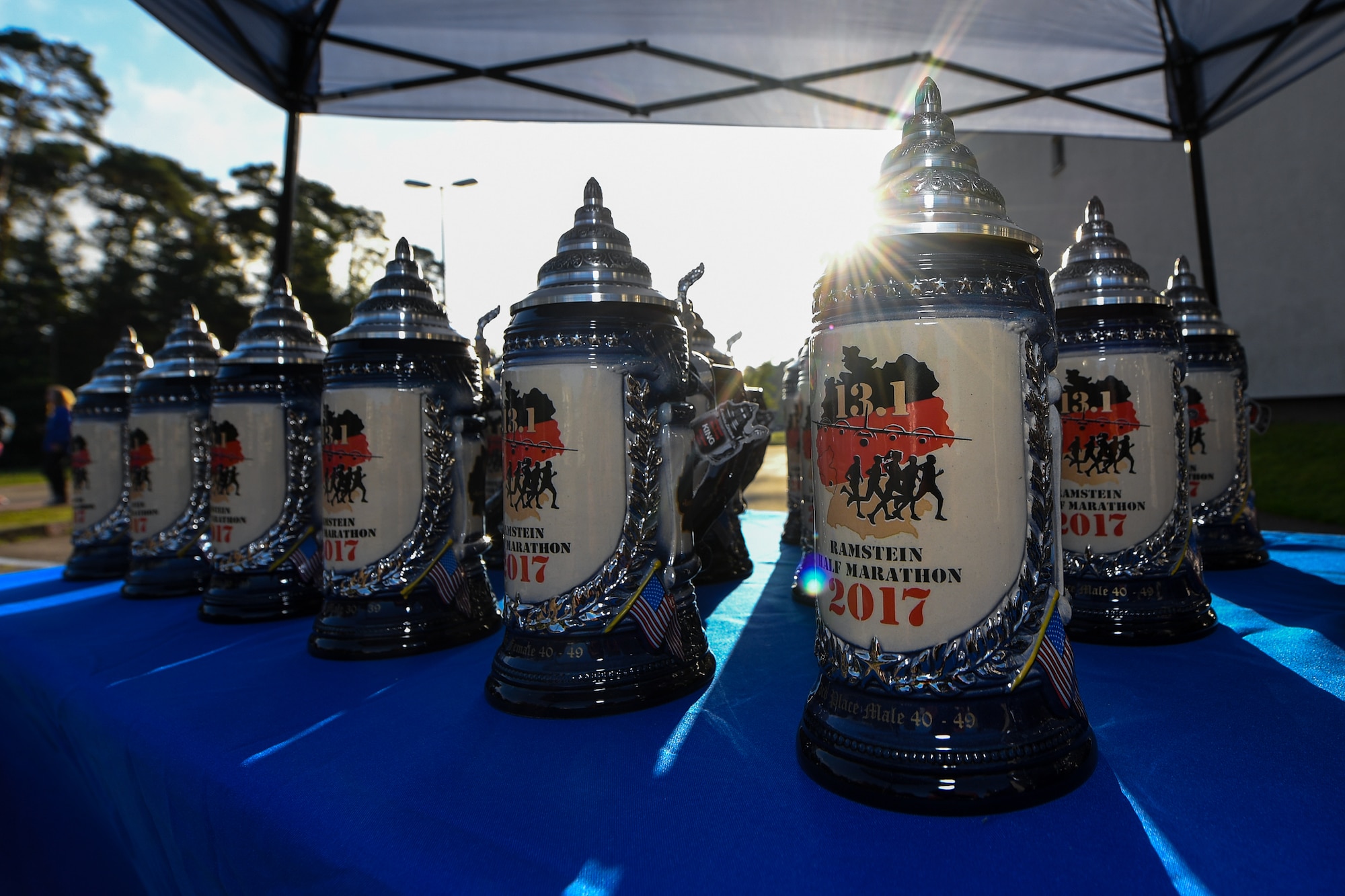 Personalized beer steins were given to the top three winners in the four aged Men and Women’s categories 7th annual Ramstein Half Marathon at Ramstein Air Base, Germany, Aug. 19, 2017.