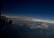 As a Joint Base Charleston, S.C. C-17 Globemaster III heads back to Charleston after a local training mission, the shadow of the 2017 total solar eclipse quickly catches up with it. Citizen Airmen from the 315th Airlift Wing happened to have a normally schedule training mission on the day the eclipse passed over South Carolina. (U.S. Air Force Photo / Tech Sgt. Bobby Pilch)