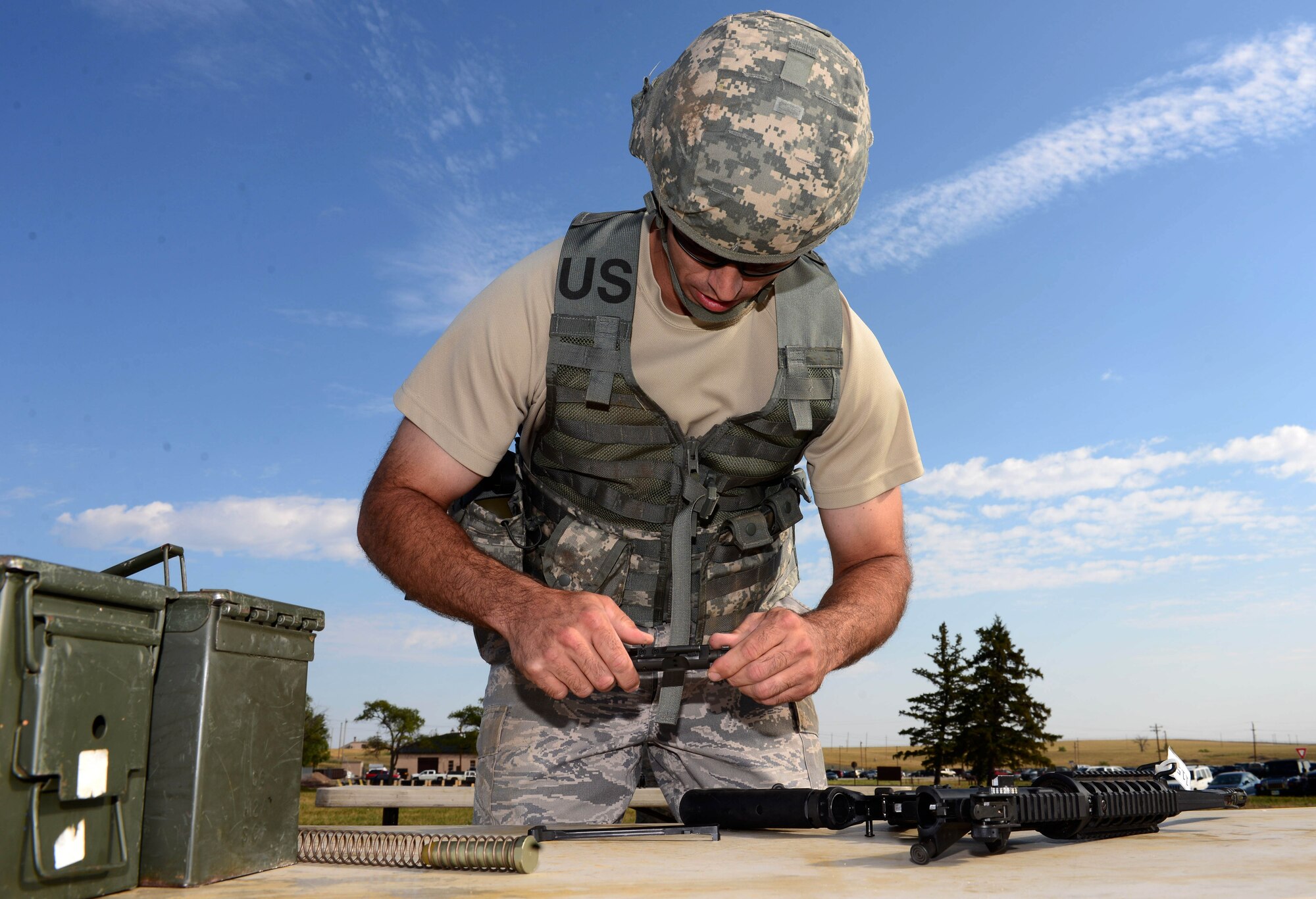 Maj. Scott Howe, the commander of the operations flight assigned to the 28th Civil Engineer Squadron, assembles an M4 during the Prime Base Engineer Emergency Force (BEEF) challenge at Ellsworth Air Force Base, S.D., Aug. 17, 2017.