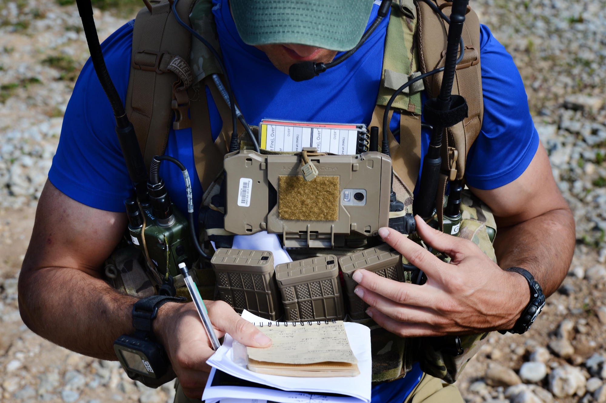 A combat controller with the 321st Special Tactics Squadron writes down a 9-line brief during a simulated close air support mission, Aug. 8, 2017, in Rakevere, Estonia. Combat controllers integrated A-10 Thunderbolt IIs from the Maryland Air National Guard's 175th Wing into the ground scheme of maneuver during simulated CAS missions. (U.S. Air Force photo by Staff Sgt. Sandra Welch )