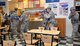 U.S. Airmen from the 100th Security Forces Squadron storm the bowling alley as they look for a simulated active shooter during an exercise Aug. 17, 2017, on RAF Mildenhall, England. Practicing for real-world responses also allows the 100th Air Refueling Wing Inspector General’s office and other agencies, including first responders, to figure out what everyone’s roles and responsibilities are. Holding regular exercises helps keep RAF Mildenhall prepared should any real-world incidents happen. (U.S. Air Force photo by Karen Abeyasekere)