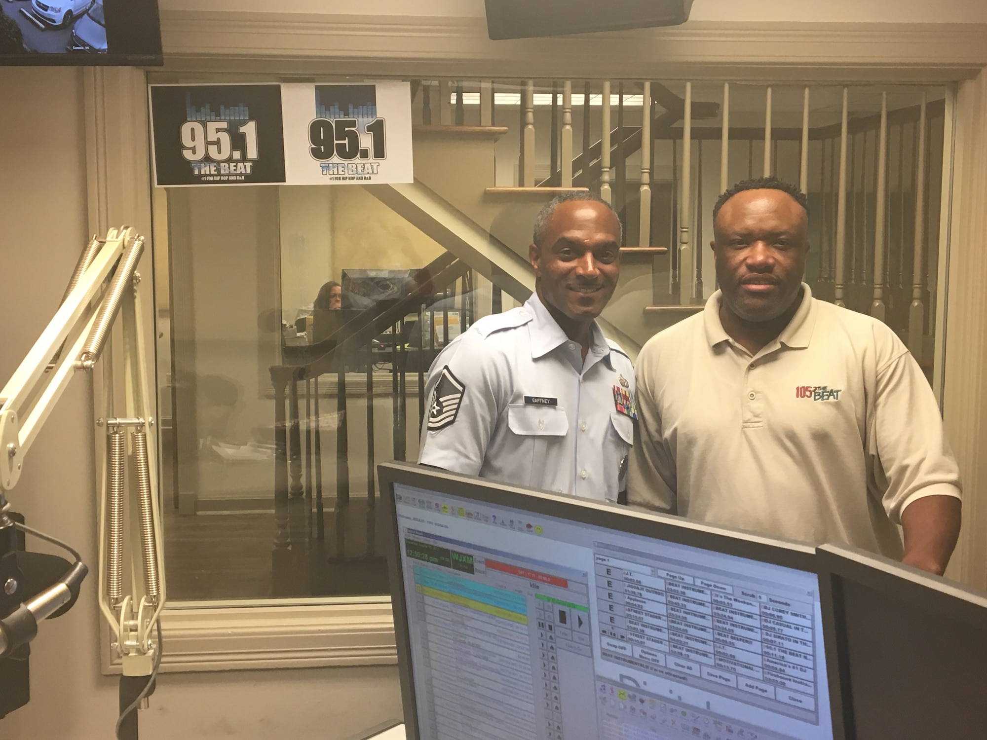 Master Sgt. David Gaffney, 403rd Wing recruiter for the Mobile, Alabama, area poses for a photo with DJ Jigga JT from 95.1 THE BEAT, Aug. 10, 2017 in Meridian, Mississippi. (U.S. Air Force photo)