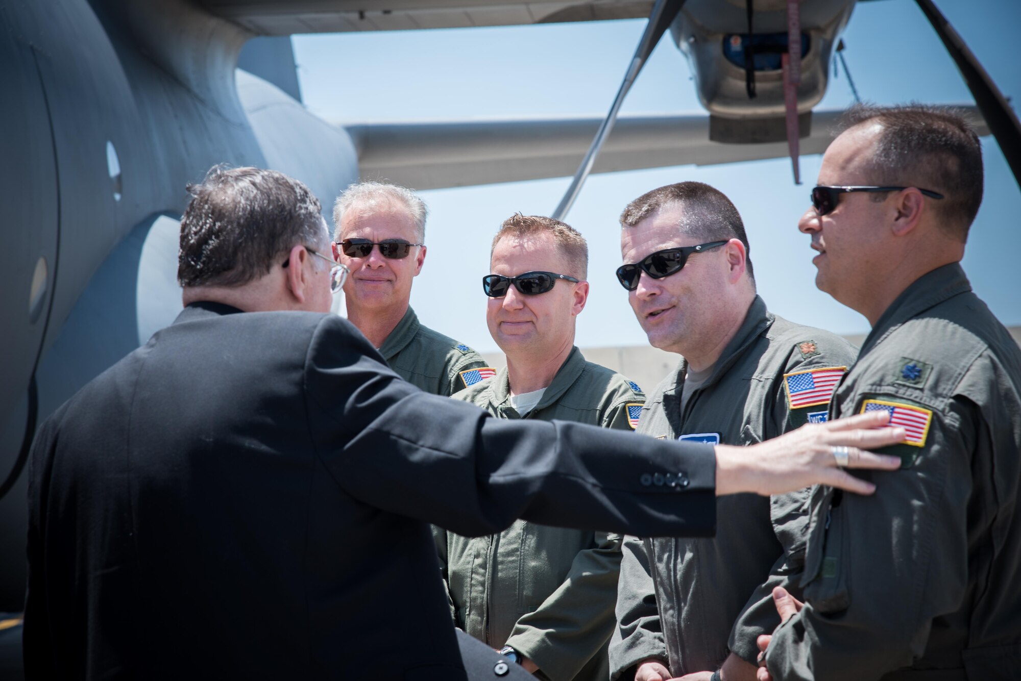 The Bishop of Biloxi, Bishop Louis Kihneman, blesses the 403rd Wing's fleet of aircraft Aug. 17, 2017 at Keesler Air Force Base, Mississippi. Kihneman visited the 403rd Wing to learn more about its mission. (U.S. Air Force photo/Staff Sgt. Heather Heiney)