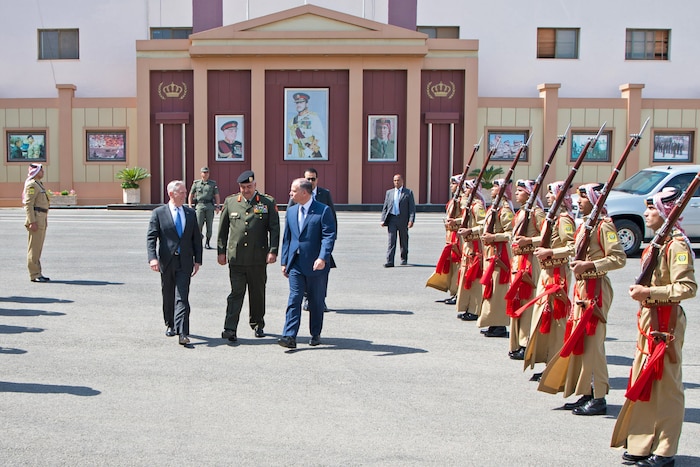 Defense Secretary Jim Mattis walks through an honor cordon.