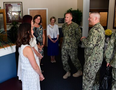 Master Chief Petty Officer of the Navy, Steven S. Giordano meets with members of Joint Base Charleston’s Fleet Family Support Center staff during a visit at the JB Charleston-Weapons Station, Aug. 16, 2017.
