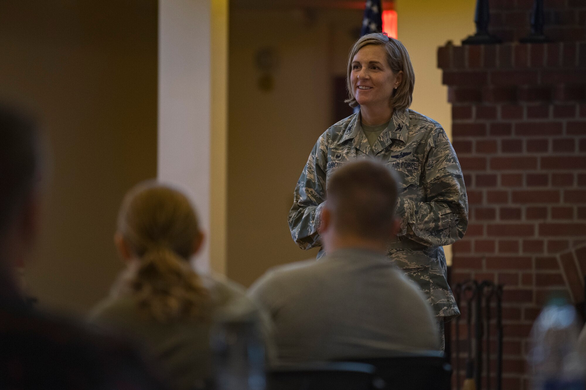 Col. Jennifer Short, 23d Wing commander, addresses a crowd of Emerge Moody and Leadership Moody students during the initial meeting of the 2018 classes, Aug. 18, 2017, at Moody Air Force Base, Ga. The Emerge Moody and Leadership Moody courses are designed to nurture the development of leaders throughout the units stationed at Moody Air Force Base. (U.S. Air Force photo by Airman 1st Class Daniel Snider)