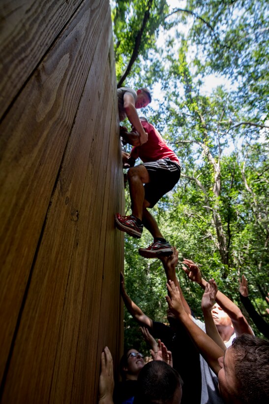 Members of Emerge Moody and Leadership Moody attempt an obstacle during the initial meeting of the 2018 classes, Aug. 18, 2017, at Valdosta State University, Ga.  The Emerge Moody and Leadership Moody courses are designed to nurture the development of leaders throughout the units stationed at Moody Air Force Base. (U.S. Air Force photo by Airman 1st Class Daniel Snider)