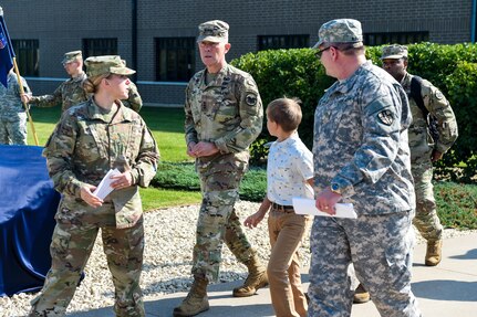 The ground rumbled, the glass shook, and the air became thick with smoke as cannons fired a 21-gun salute to commemorate the 100th anniversary of the 88th Regional Support Command, here, at Fort McCoy, Wisconsin.