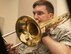 U. S. Air Force Senior Airman James Wright, a trombonist with the United States Air Force Band of the Golden West, rehearses with other members of the Travis Brass Quintet at Travis Air Force Base, Calif., Aug. 7, 2017. One of the cornerstone ensembles for the U. S. Band of the Golden West, Travis Brass has been delighting audiences in the Western U.S. for several decades. The brass quintet is made up of two trumpets, a horn, a trombone and a tuba. (U.S. Air Force photo/ Heide Couch)