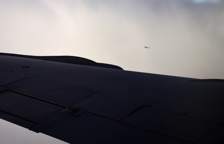 Two KC-135 Stratotankers assigned to McConnell Air Force Base, Kan. approach each other prior to air refueling training during the solar eclipse Aug. 21, 2017, in the path of totality. The KC-135 has been the backbone of the Air Force’s air refueling fleet for nearly 61 years. (U.S. Air Force photo/Staff Sgt. Trevor Rhynes)