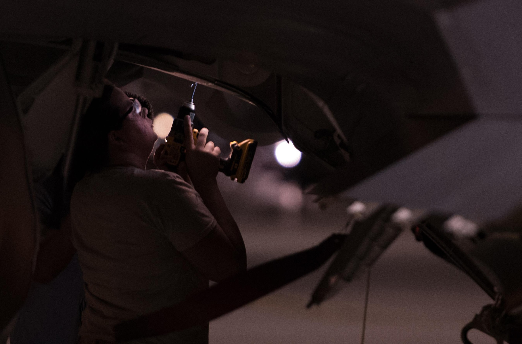 U.S. Air Force Staff Sgt. Deirdre Baker, 1st Maintenance Squadron, performs low-observable maintenance on an F-22 Raptor from the 94th Fighter Squadron at Nellis Air Force Base, Nev., Aug. 21, 2017.  The 94th FS is currently deployed to Red Flag 17-4, taking part in an multi-dimensional simulated air and ground combat environment. (U.S. Air Force photo by Staff Sgt. Carlin Leslie)