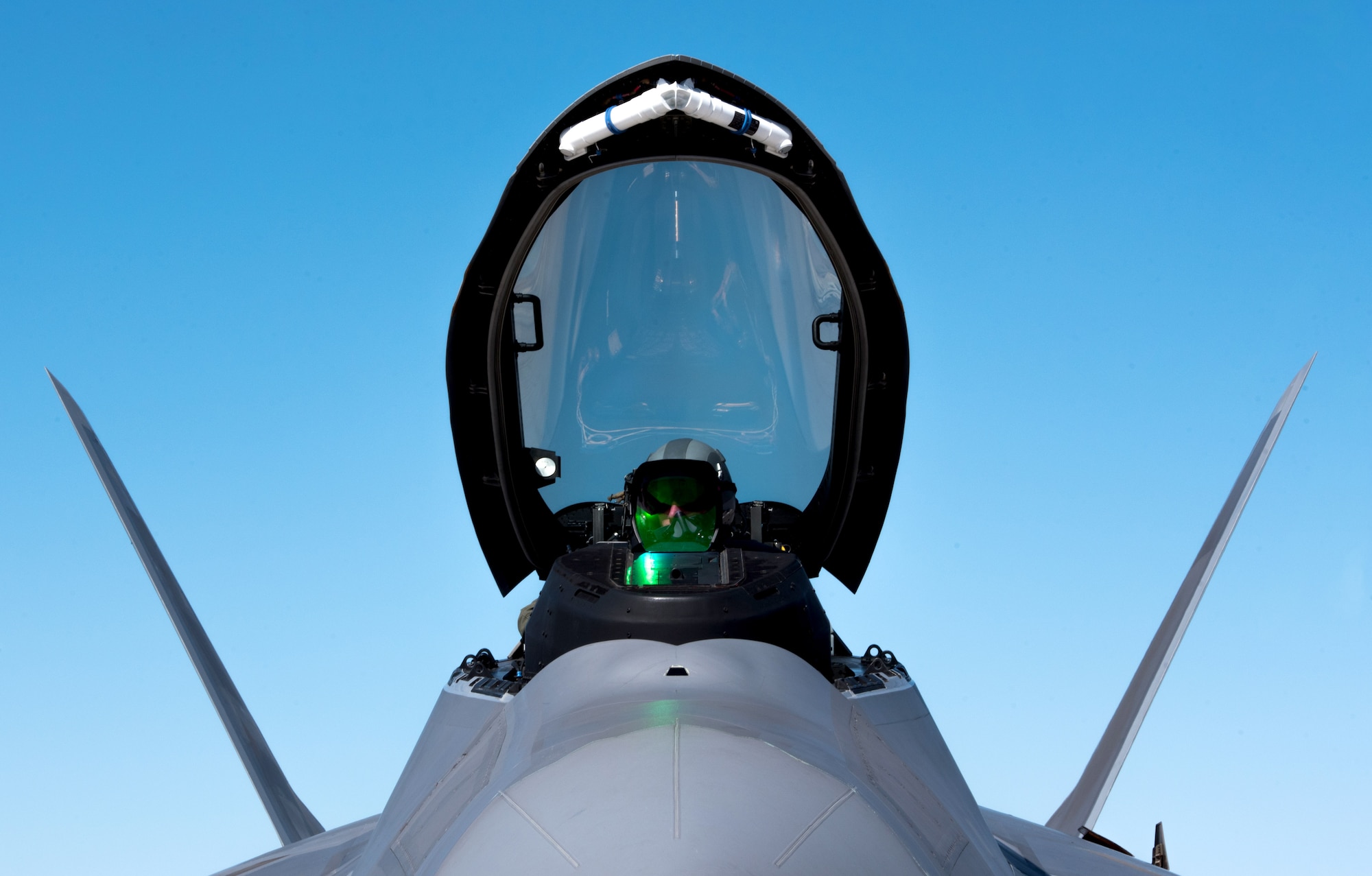 U.S Air Force Capt. Kidnap, 94th Fighter Squadron F-22 Raptor pilot, shuts his aircraft down after landing at Nellis Air Force Base, Nev., August 18,2017. The 94th FS is currently deployed to Red Flag 17-4, taking part in an multi-dimensional simulated air and ground combat environment. (U.S. Air Force photo by Staff Sgt. Carlin Leslie)