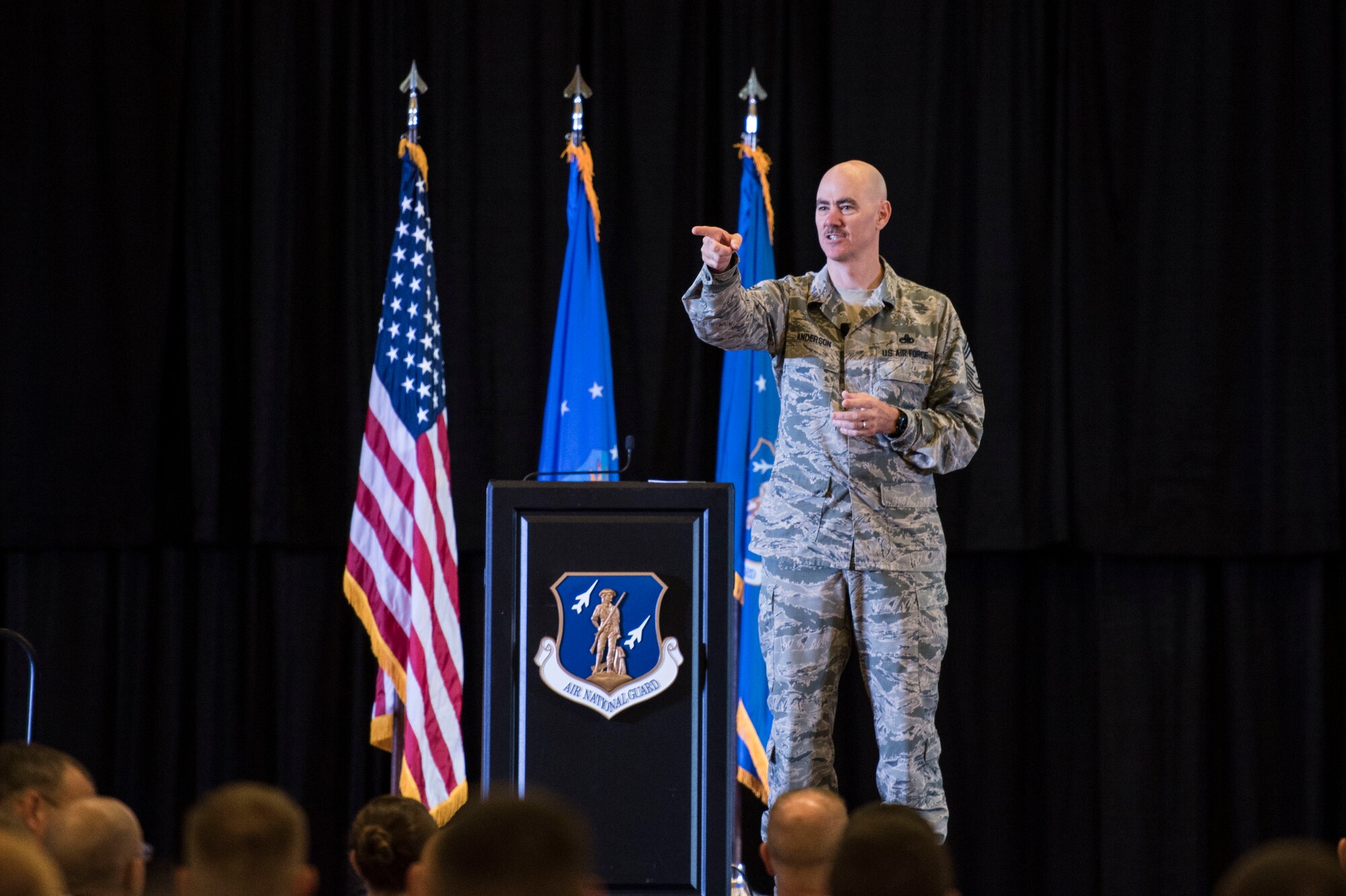 Command Chief of the Air National Guard, Chief Master Ronald Anderson welcomes Airmen to the Enlisted Leadership Symposium at Camp Dawson, W.Va., Aug. 15-17. Nearly 350 Airmen representing Air National Guard units from each state, territory and the District of Columbia, attended the event, hosted by the Command Chief of the Air National Guard, Chief Master Ronald Anderson. The three-day event focused on leadership and professional development. Airmen, non-commissioned officers and senior non-commissioned officers were hand-selected by their units to attend the event. (U.S. Air National Guard photo/Senior Master Sgt. Emily Beightol-Deyerle)