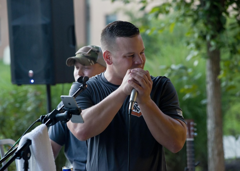 Airmen from the Air National Guard Band of the South perform August 15, 2017, at the ANG's 2017 Enlisted Leadership Symposium in Camp Dawson, West Virginia. The three-day event was designed to provide enlisted Airmen of all levels with a broad range of leadership tools to apply in their units. (U.S. Air National Guard photo/Staff Sgt. John E. Hillier)