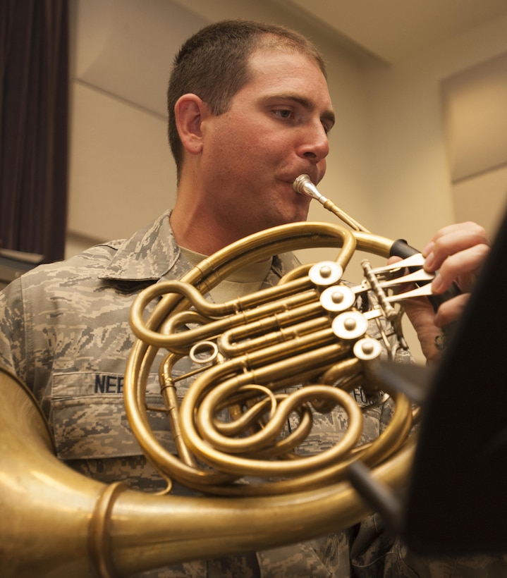 U. S. Air Force Senior Airman Daniel Nebel, United States Air Force Band of the Golden West, plays a French horn during rehearsal with other members of the Travis Brass Quintet at Travis Air Force Base, Calif., Aug. 7, 2017.  One of the cornerstone ensembles for the U. S. Band of the Golden West, Travis Brass has been delighting audiences in the Western U.S. for several decades. The brass quintet made is up of two trumpets, a horn, a trombone and a tuba.