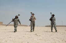 U.S Air Force Airmen from the GeoBase Shop with the 379th Expeditionary Civil Engineer Squadron, completed their surveys for new construction projects at Al Udeid Air Base, Qatar, Aug. 2, 2017. The GeoBase Shop helps with the planning and managing of construction projects with tasks that include surveying, computer-aided drafting programs and if needed soil testing.  (U.S. Air Force photo by Tech. Sgt. Amy M. Lovgren)