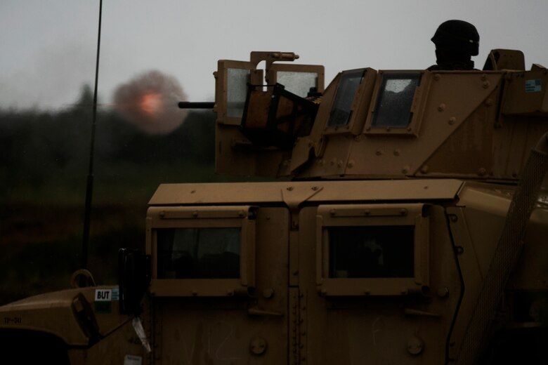 A U.S. Marine with Black Sea Rotational Force 17.1 fires a 50. Caliber Machine Gun during a mount range aboard Adazi Military Base, Latvia, June 8, 2017. The event was a part of Exercise Saber Strike 17, a multinational training exercise with NATO Allies and partner nations to increase cohesion and skills through combined-arms training (U.S. Marine Corps photo by Cpl. Sean J. Berry)