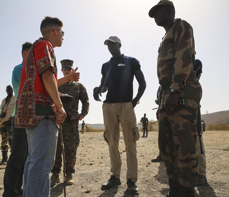 Cpl. Jonathan Leboeuf, a field radio operator with Special Purpose Marine Air-Ground Task Force – Crisis Response – Africa, acts as a role player to add a realistic experience for soldiers with Senegal’s 5th Contingent in Mali during the final exercise of a peace keeping operations training mission at Thies, Senegal, June 13, 2017. Marines and Sailors with SPMAGTF-CR-AF served as instructors and designed the training to enhance the soldiers’ abilities to successfully deploy in support of United Nations peacekeeping missions in the continent. (U.S. Marine Corps photo by Sgt. Samuel Guerra/Released)