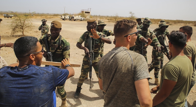 U.S. Marines with Special Purpose Marine Air-Ground Task Force – Crisis Response – Africa act as role players during the final exercise of a peacekeeping operations training mission at Thies, Senegal, June 13, 2017. Marines and Sailors with SPMAGTF-CR-AF served as instructors and designed the training to enhance the soldiers’ abilities to successfully deploy in support of United Nations peacekeeping missions in the continent. (U.S. Marine Corps photo by Sgt. Samuel Guerra/Released)
