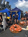 U.S. Navy and Marine Corps divers provide support to the USS John S. McCain (DDG 56) at Changi Naval Base, Singapore Aug. 23, 2017. The McCain sustained significant damage following a collision with the merchant vessel Alnic MC while underway east of the Strait of Malacca and Singapore on Aug. 21, 2017.