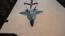 A 27th Expeditionary Fighter Squadron pilot disengages an F-22 Raptor from the boom of a 908th Expeditionary Air Refueling Squadron KC-10 Extender Aug. 22, 2017, in the skies over southwest Asia.