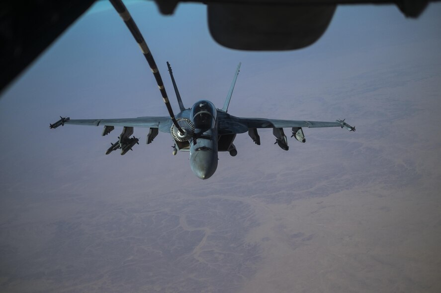 An F/A-18 Super Hornet refuels from a 908th Expeditionary Air Refueling Squadron KC-10 Extender Aug. 22, 2017, in the skies over southwest Asia.