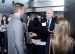 Summer interns converse with senior DIA staff member.