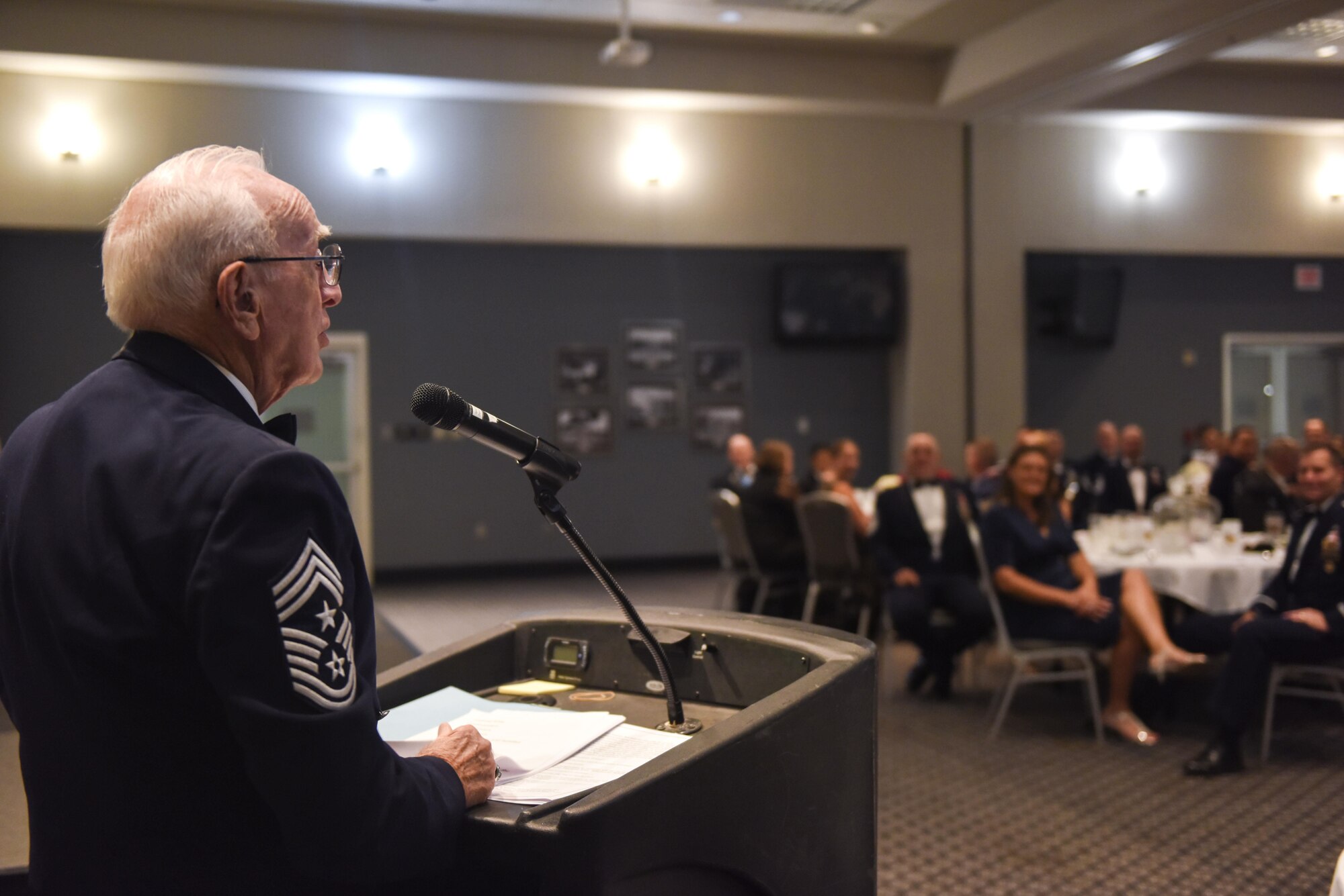 Retired Chief Master Sgt. Robert Mehaffey, guest speaker, speaks during the Senior NCO Induction Ceremony at the Event Center on Goodfellow Air Force Base, Texas, Aug. 18, 2017. The speech focused how to lead as a SNCO. (U.S. Air Force photo by Airman 1st Class Chase Sousa/Released)